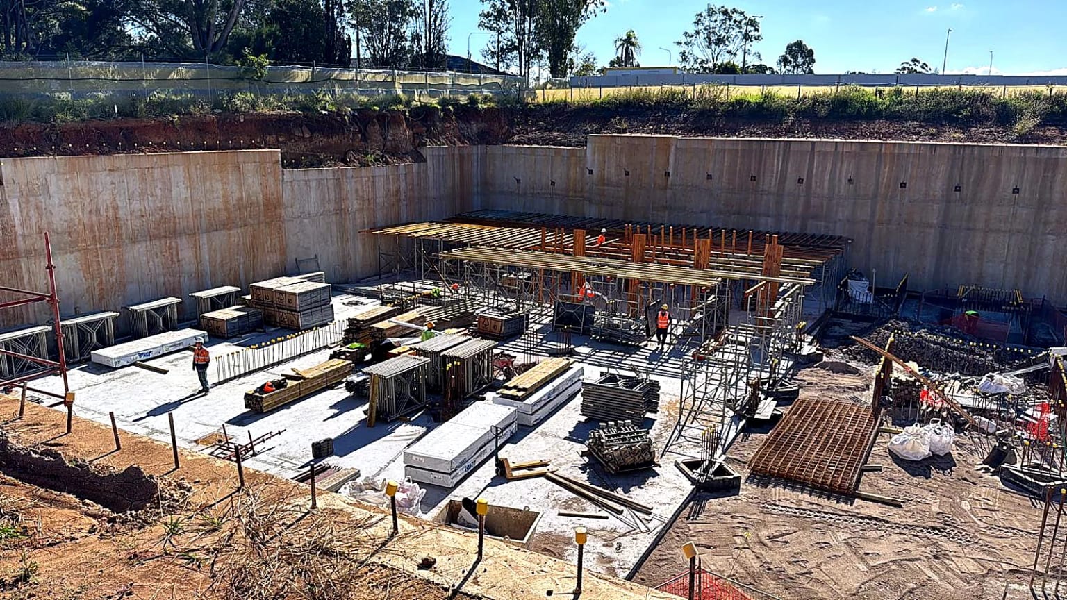 Shoring and timber bearers assembled for suspended slab formwork.