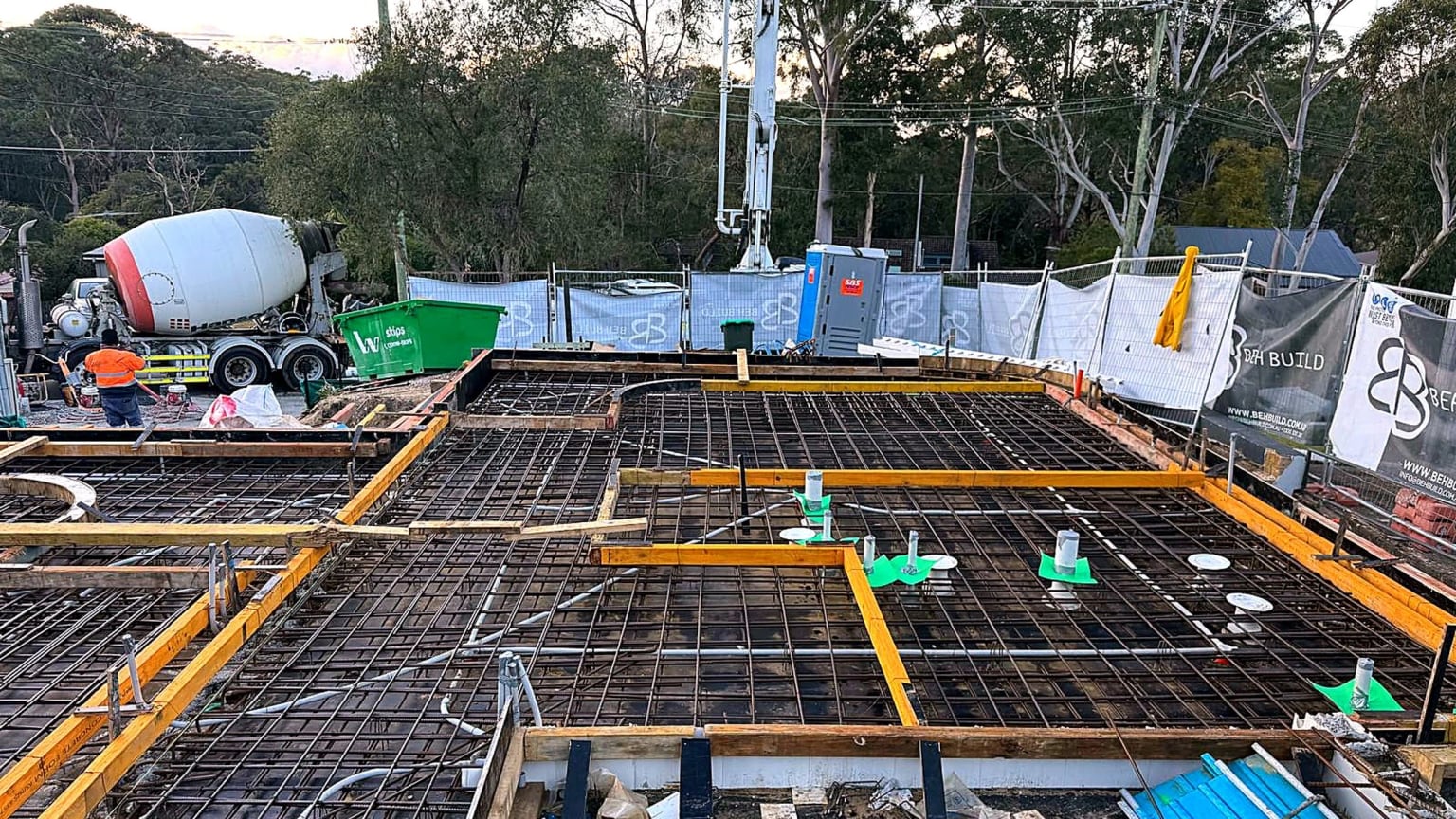 Reinforcement mesh and edge formwork prepared across a concrete deck.
